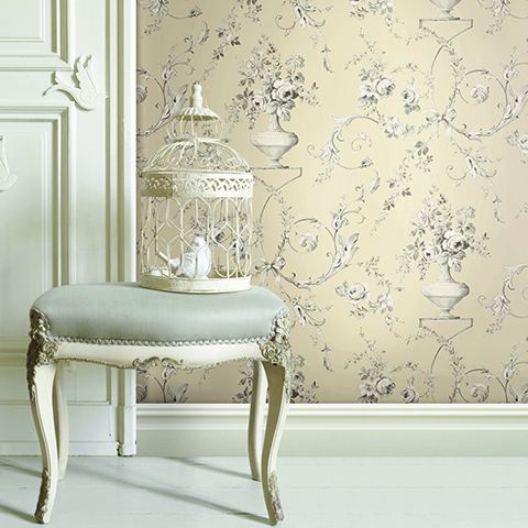 Upholstered stool with ornate bird cage an white dove decorations on a panelled wall