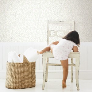 Girl Climbing onto Chair